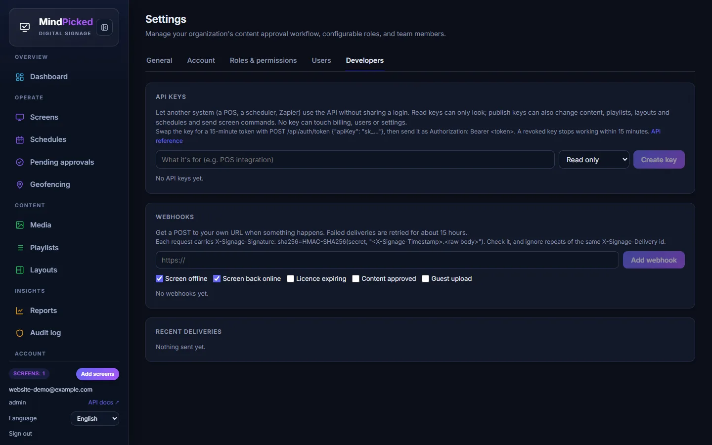 Developers settings with API key creation and webhook events for screen offline, back online, licence expiring, content approved and guest upload